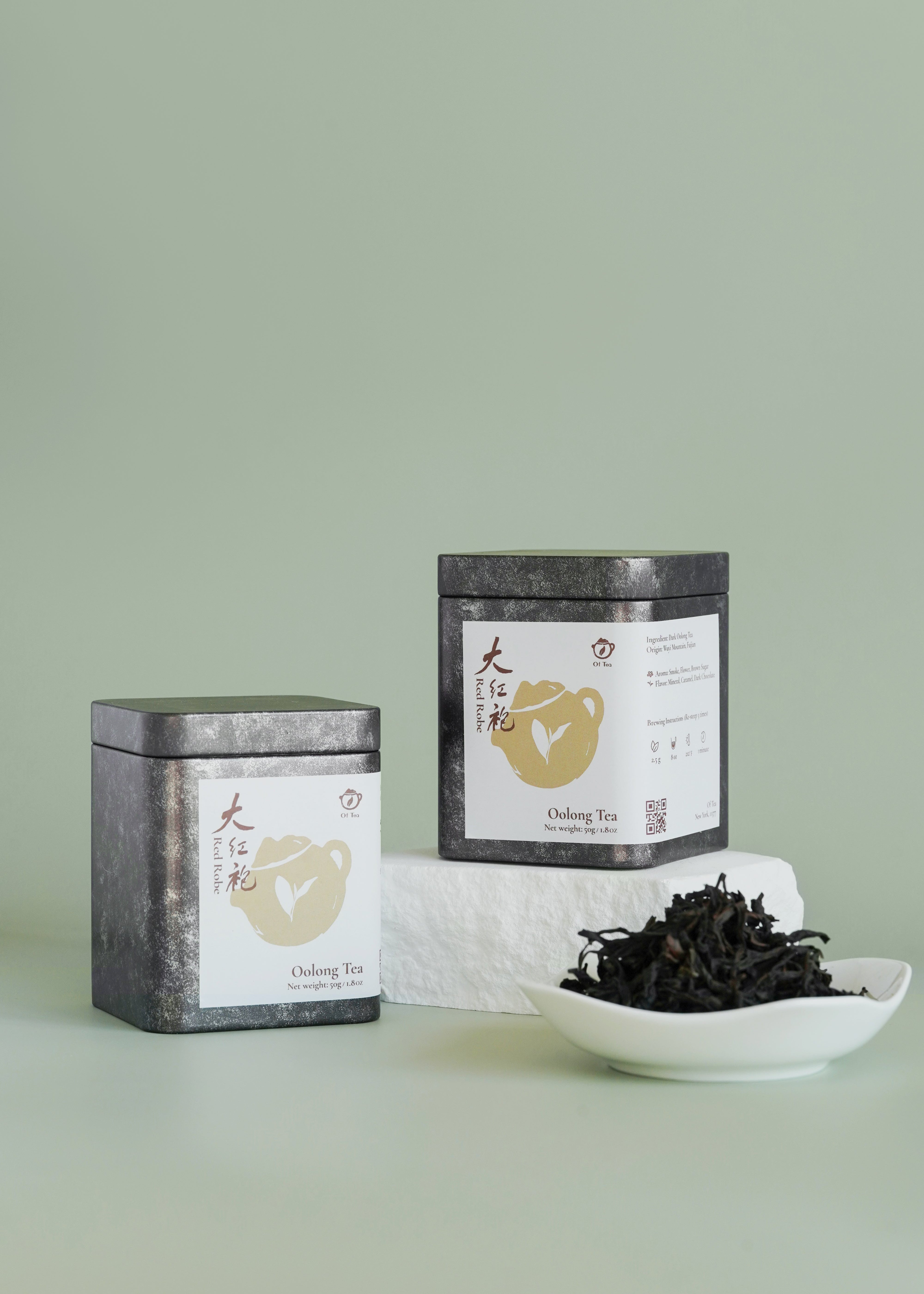 Tea packaging with a bowl of tea leaves on a light green background. Big red robe, da hong pao